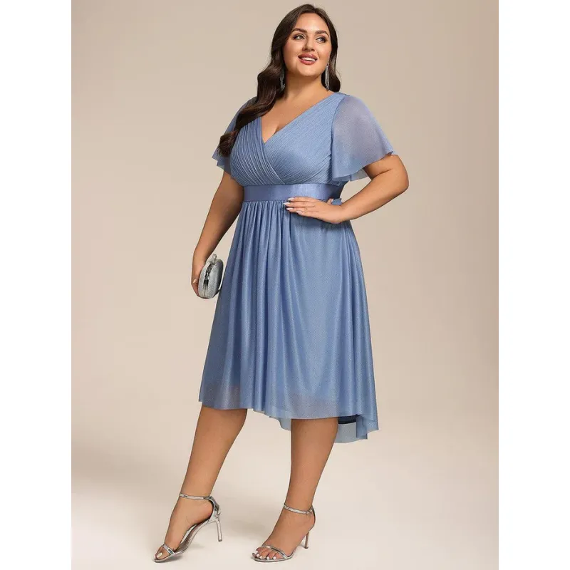 ELEGANTNE SVETLUCAVE MIDI HALJINE