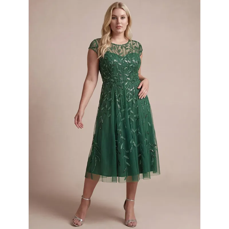 Elegantne tea length haljine sa listićima i tilom